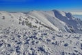 Winter mountain landscape. Snow at high altitude - Ciucas Mountains, landmark attraction in Romania Royalty Free Stock Photo