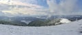 Winter mountains in the clouds. track for skiing and snowboarding