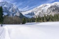 Winter mountains landscape with groomed ski track Royalty Free Stock Photo