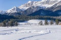Winter mountains landscape with groomed ski track Royalty Free Stock Photo