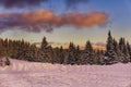 Winter mountains landscape. Sunset with dramatic clouds. Royalty Free Stock Photo