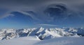 Winter mountains with magic clouds Royalty Free Stock Photo