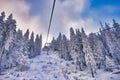 Winter mountains panorama with ski slopes and ski lifts Royalty Free Stock Photo