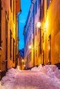 Winter narrow street in the Old Town in Stockholm, Sweden Royalty Free Stock Photo