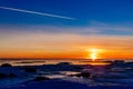 Winter nature landscape. Sunset over frozen sea. Royalty Free Stock Photo