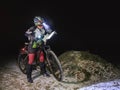 Winter night extreme bike racer control navigation and map Royalty Free Stock Photo