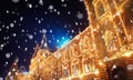 Winter night light Moscow Red square with snow. Christmas panorama Russia holidays GUM new year background bokeh Royalty Free Stock Photo