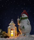 Winter Night With Snowman and Lantern Royalty Free Stock Photo
