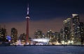 Winter night view on waterfront in Downtown Toronto with CN Tower spire, light of the Harbourfront Centre outdoor Royalty Free Stock Photo