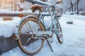 Winter nostalgia Vintage bike covered in snow during winter season