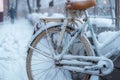 Winter nostalgia Vintage bike covered in snow during winter season