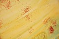 Winter orange yellow wax blue vivid spots, waxy background, creative design Royalty Free Stock Photo