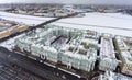 The Winter Palace from Palace Square, aerial view. Panorama of the Neva river with Palace Bridge and the Vasilyevsky Island at Royalty Free Stock Photo