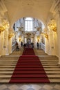 Winter Palace. Tourists in the interior of the main parad Jordanian staircase. Royalty Free Stock Photo