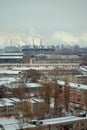 Winter panorama of the Central district of the city of Togliatti with a view of the smoking chimneys of chemical plants.