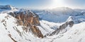 Winter panorama in Dolomites mountains, Italy - view from Pordoi peak Sass Pordoi towards an impressive ravine Royalty Free Stock Photo