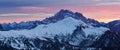 Winter panorama of fir trees covered with white snow with dolomiti mountain background, Dolomites, Italy Winter evening Royalty Free Stock Photo