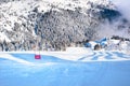 Winter panorama of the slopes at ski resort, snow trees, blue sky Royalty Free Stock Photo
