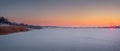 Winter panorama with a view to the frozen Delia lake covered with snow in Ungheni town, Moldova Royalty Free Stock Photo