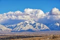 Winter Panoramic view of Snow capped Wasatch Front Rocky Mountains, Great Salt Lake Valley and Cloudscape. Utah Royalty Free Stock Photo