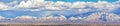 Winter Panoramic view of Snow capped Wasatch Front Rocky Mountains, Great Salt Lake Valley and Cloudscape. Utah Royalty Free Stock Photo