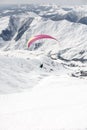 Winter paragliding in Gudauri mountains