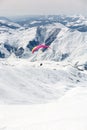 Winter paragliding in Gudauri mountains Royalty Free Stock Photo