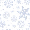 Winter pattern with blue snowflakes on white background . Winter seamless pattern.