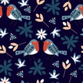 Winter pattern with bullfinches and flowers on a blue background. Seamless vintage floral texture in scandinavian style for fabric Royalty Free Stock Photo