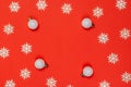 Winter pattern. Silver balls, white snowflakes in shape frame on red background for greeting card. Christmas, winter, new year Royalty Free Stock Photo
