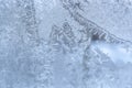 Winter pattern at window glass as Christmas or New Year background. Royalty Free Stock Photo