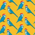 Cute merry Christmas blue parrot in red hat