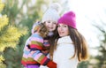 Winter and people concept - portrait of a happy mother and child Royalty Free Stock Photo