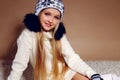 Winter photo of cute little girl whith long blond hair Royalty Free Stock Photo