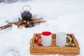 Winter picnic, kettle over an open fire
