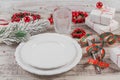 Winter table place setting with Christmas or New Year decorations Royalty Free Stock Photo