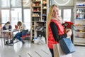 Winter portrait blonde girl with Christmas shopping