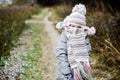 Winter portrait of child girl in warm clothes