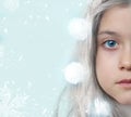 Winter portrait of a pretty little girl, with copy space and snowflakes Royalty Free Stock Photo