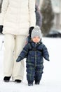 Winter portrait of toddler boy with mother