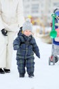 Winter portrait of toddler boy with mother Royalty Free Stock Photo