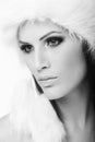 Winter portrait of woman in fur cap Royalty Free Stock Photo