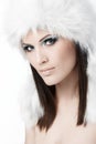 Winter portrait of woman in fur cap Royalty Free Stock Photo