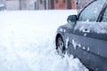 Winter problems of car drivers. Frozen car covered snow at winter day