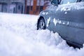 Winter problems of car drivers. Car on a snowy road. car stuck in snow Royalty Free Stock Photo