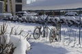 Winter provincial landscape with old parked bicycles Royalty Free Stock Photo