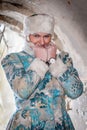Winter queen in an abandoned castle. A beautiful woman in a winter suit Royalty Free Stock Photo