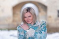 Winter queen in an abandoned castle. A beautiful woman in a winter suit Royalty Free Stock Photo