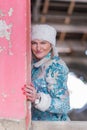 Winter queen in an abandoned castle. A beautiful woman in a winter suit Royalty Free Stock Photo