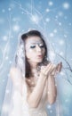 Winter queen blowing kisses Royalty Free Stock Photo